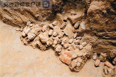 陕西西咸新区工地发现古代遗存65件佛像头