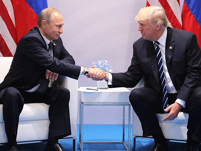 7月7日，德国汉堡，出席二十国峰会的俄罗斯总统普京（左）与美国总统<span style=